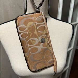 Classic Coach wristlet. Approximately 8" x 4". Multicolor brown/tan pattern
